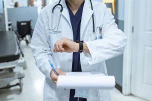 Doctor Looking at the Time